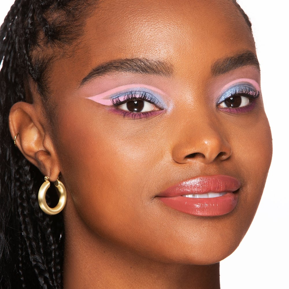 model with blue eyeshadow and pink liner 