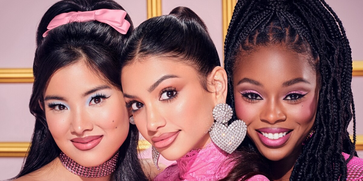 three models showing face makeup