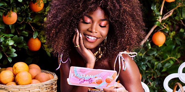 model holding italian spritz palette 